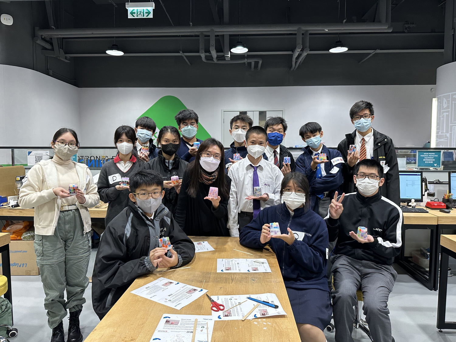 Students crafting candles in an art class