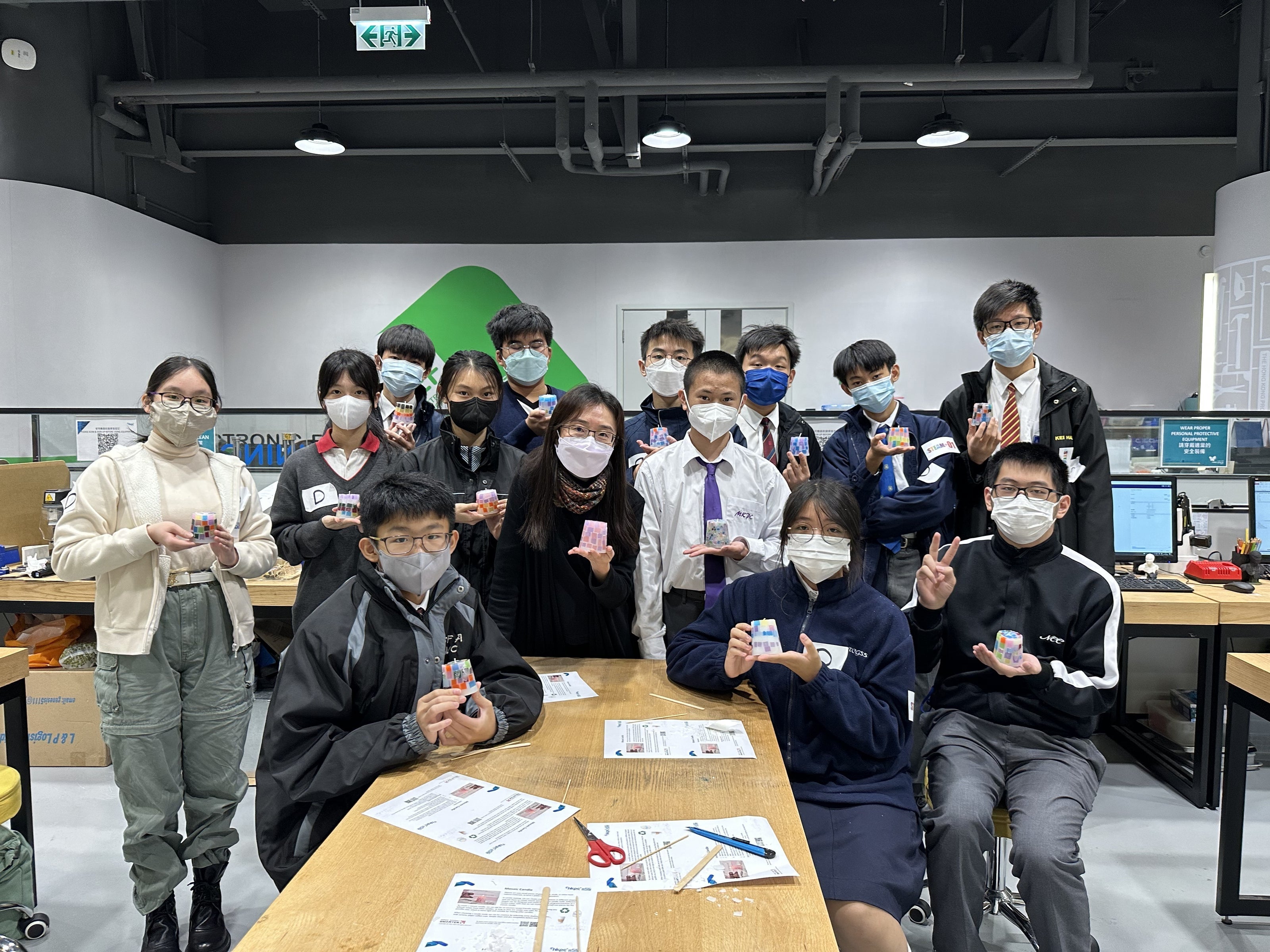 Students crafting candles in an art class